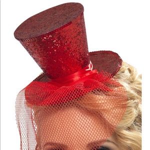 Mini top hat on a headband. Red glitter.